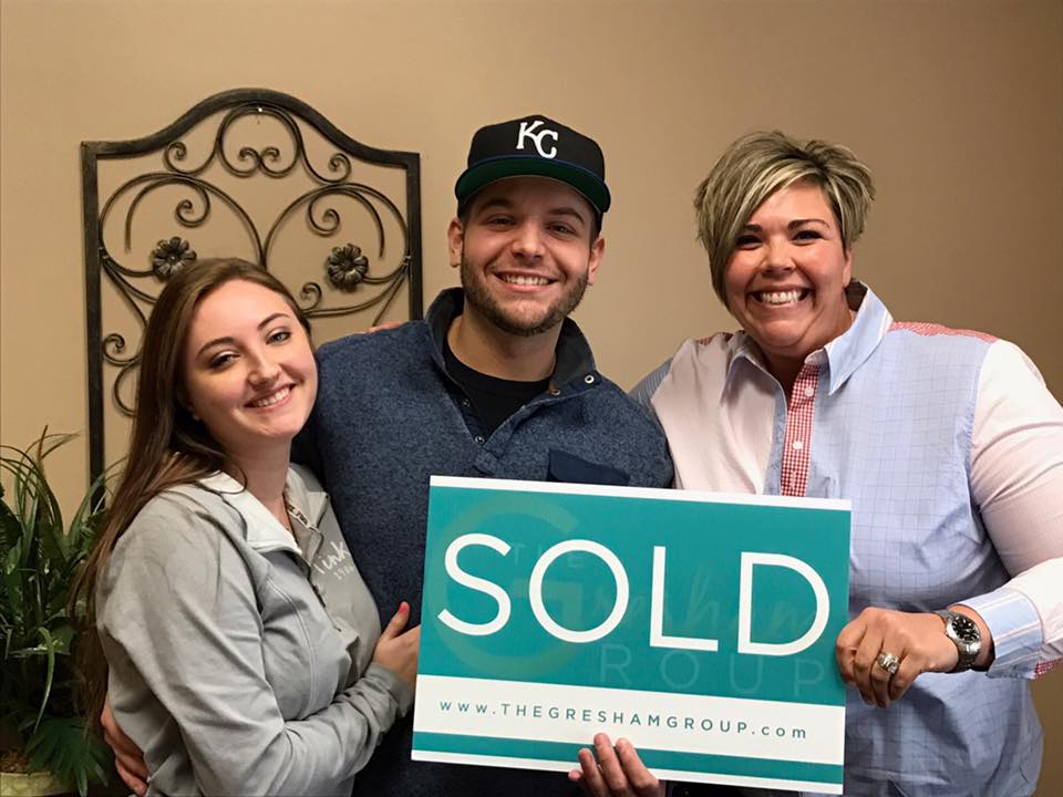 leah beck with her clients smiling